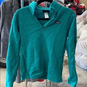 Women’s teal Patagonia sweater jacket size medium